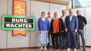 Burg-Wächter feiert fünf langjährige Mitarbeiter
