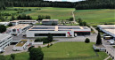 Fischer nimmt neue Teilelagerhalle in Betrieb